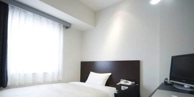 Hotel Mid In Akabane Ekimae Токио Номер фото